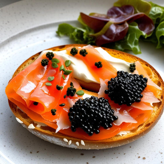 Toasted bagel with cream cheese, silky lox, and a generous dollop of black caviar, perfect for a luxurious brunch or gourmet breakfast.