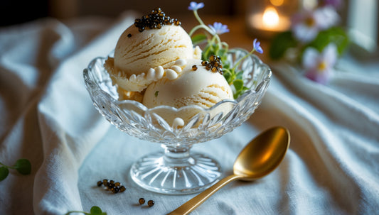 Caviar ice cream elegantly served in a chilled bowl, garnished with a dollop of Opus Golden Sturgeon Caviar and a sprig of fresh dill.